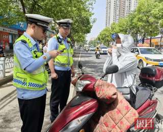 湖北谷城交警持续开展不文明交通违法行为整治