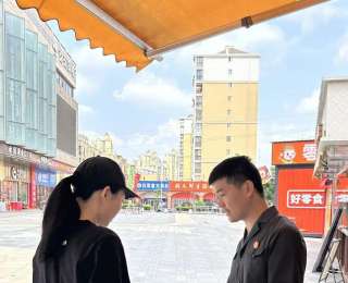 民法典宣传来到盘龙城万达广场，黄陂法院助力商户依法经营