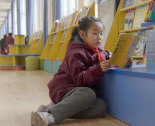 这所小学用“书香校园”浸染“书香童年”