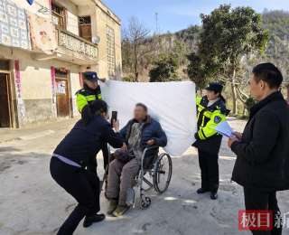 这张“身份证”有点暖！谷城民警为残疾群众上门办证