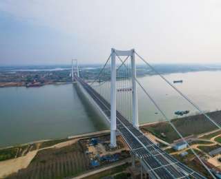 为了这群“微笑天使”，他们架桥特意绕行1公里